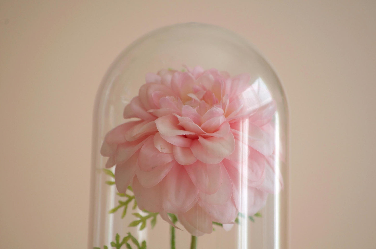 Dahlia silk flower arrangement inside of a flower cloche